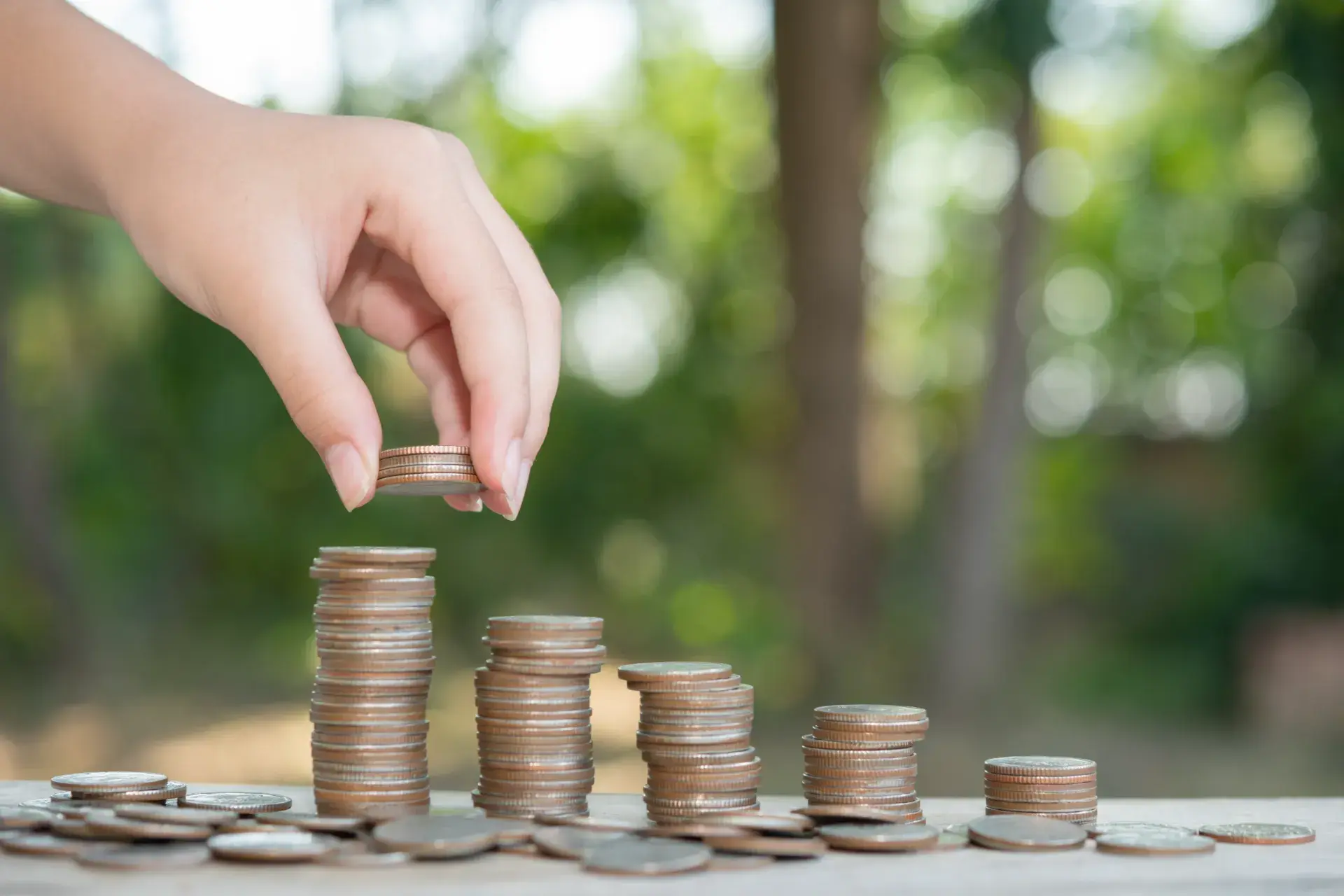 Saving Money Concept Preset By Male Hand Putting Money Coin Stack Growing Business Arrange Coins Into Heaps With Hands Content About Money Cropped